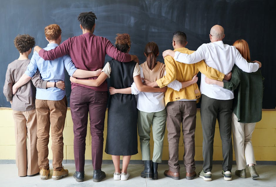 Image of a diverse team collaborating in a hybrid work environment